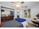 Bedroom featuring wood-look flooring, good closet space, and neutral decor at 5236 Madison St, New Port Richey, FL 34652