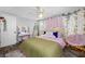 Stylish bedroom with a unique decor featuring string lights and a comfortable layout at 5236 Madison St, New Port Richey, FL 34652