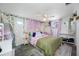 Cozy bedroom featuring ambient lighting, a plush bed, and decorative plants at 5236 Madison St, New Port Richey, FL 34652