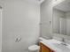 Bathroom with vanity, mirror, toilet and a combination shower and tub at 5396 Berrien Ave, Spring Hill, FL 34608