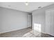 Bedroom features wood-look floors, a closet, and a light neutral color scheme at 5396 Berrien Ave, Spring Hill, FL 34608