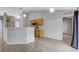 Bright kitchen featuring a breakfast bar, wood cabinets and stainless steel appliances at 5396 Berrien Ave, Spring Hill, FL 34608