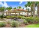Outdoor gazebo with picnic tables surrounded by landscaping, perfect for community gatherings at 5430 Thistle Field Ct, Wesley Chapel, FL 33545