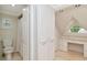 Bathroom with vanity, toilet and storage area at 560 Bosphorous Ave, Tampa, FL 33606