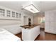 Well-lit kitchen boasts ample cabinets and a center island with a cooktop at 560 Bosphorous Ave, Tampa, FL 33606