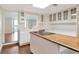 Bright kitchen featuring a center island and sleek countertops at 560 Bosphorous Ave, Tampa, FL 33606