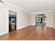 Light filled living room featuring an arched doorway leading to the sunroom at 560 Bosphorous Ave, Tampa, FL 33606