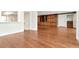 Spacious living room with beautiful hardwood floors and custom built-in cabinetry at 560 Bosphorous Ave, Tampa, FL 33606