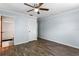Bedroom boasts hardwood floors and features an ensuite bathroom and ample closet space at 5860 99Th N Ave, Pinellas Park, FL 33782