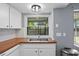 Kitchen sink area featuring natural light at 5860 99Th N Ave, Pinellas Park, FL 33782