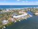 Waterfront condos feature a private pool, boat docks, and lovely gulf views at 615 Dream Island Pl # 210, Longboat Key, FL 34228