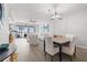 Spacious living room with lots of natural light, views of the water, and modern decor at 615 Dream Island Pl # 210, Longboat Key, FL 34228