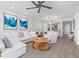 Inviting living room with stylish furnishings and plenty of natural light at 615 Dream Island Pl # 210, Longboat Key, FL 34228