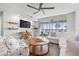 Inviting living room with stylish furnishings, water views, and plenty of natural light at 615 Dream Island Pl # 210, Longboat Key, FL 34228