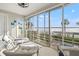 Enclosed lanai with views of the water and the intercoastal at 615 Dream Island Pl # 210, Longboat Key, FL 34228