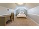 Bedroom with a desk and bed, featuring wainscoting detail and natural light at 7725 235Th E St, Myakka City, FL 34251