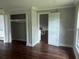 Open bedroom with closet, new flooring, and natural light at 8033 55Th E St, Palmetto, FL 34221