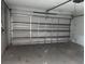 Spacious two-car garage with an automatic garage door and ample space at 8033 55Th E St, Palmetto, FL 34221