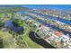 Waterfront homes in a community with canals and green spaces at 832 Birdie Way, Apollo Beach, FL 33572