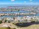 An aerial view of waterfront homes on a sunny day at 832 Birdie Way, Apollo Beach, FL 33572