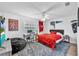Bedroom featuring sports-themed decor, desk, and ample space for relaxation at 832 Birdie Way, Apollo Beach, FL 33572