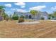 Attractive home with lush landscaping, a well-manicured lawn, and a welcoming front entrance at 832 Birdie Way, Apollo Beach, FL 33572