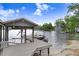 Private boat dock on a serene lake, complete with a boat lift for easy access to water activities at 8903 Donna Lu Dr, Odessa, FL 33556