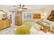 Charming bedroom with wood-look floors, stylish furnishings, closet, and a bright, airy feel perfect for relaxation at 8903 Donna Lu Dr, Odessa, FL 33556