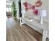 Lovely entryway with wood floors, decorative wall art, and stylish decor at 9024 Barrier Coast Trl, Parrish, FL 34219