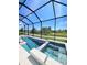 The property features a sparkling pool and a relaxing spa, perfect for outdoor enjoyment at 9024 Barrier Coast Trl, Parrish, FL 34219