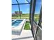 Relaxing spa next to artificial turf at 9024 Barrier Coast Trl, Parrish, FL 34219