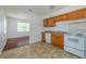 Cozy kitchen area with view into the living room, natural light, and ample counter space at 932 W Wheeler Rd, Brandon, FL 33510