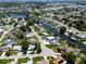 Community aerial view showing waterfront access with homes along the canals and waterways, and residential neighborhoods at 621 Gran Kaymen Way, Apollo Beach, FL 33572