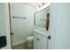 This updated bathroom features modern vanity and shower with tile surround at 621 Gran Kaymen Way, Apollo Beach, FL 33572