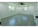 Cozy bedroom featuring tile floors, neutral paint, and plenty of natural light at 621 Gran Kaymen Way, Apollo Beach, FL 33572