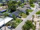 Exterior aerial view of property displaying mature landscaping, dark shingled roof, and neighborhood location at 621 Gran Kaymen Way, Apollo Beach, FL 33572