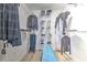 Walk-in closet featuring an organization system and ample space for clothing and accessories at 10081 Sage Creek Dr, Sun City Center, FL 33573