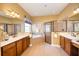 Large bathroom with double vanity sinks, soaking tub, and separate glass shower at 10513 Palm Cove Ave, Tampa, FL 33647