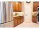 Well-equipped kitchen with stainless steel refrigerator and ample cabinet space at 10513 Palm Cove Ave, Tampa, FL 33647