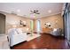 Spacious living room with hardwood floors, neutral tones, and elegant furniture at 10513 Palm Cove Ave, Tampa, FL 33647