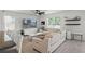 Living room with ceiling fan and hardwood flooring at 10823 Trailing Vine Dr, Tampa, FL 33610