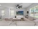 Comfortable living room featuring hardwood flooring at 10823 Trailing Vine Dr, Tampa, FL 33610