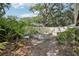 A backyard with a concrete block garden plot at 10902 Bent Tree Pl, Tampa, FL 33618