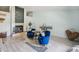 Cozy living room showcasing stylish décor, a fireplace, and hardwood flooring at 10902 Bent Tree Pl, Tampa, FL 33618