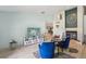 Open living room with hardwood floors, fireplace, stylish decor, and plenty of natural light at 10902 Bent Tree Pl, Tampa, FL 33618