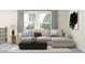 Comfortable living room with a cozy sectional sofa, decorative pillows, and a modern coffee table at 11740 E 71St Ave, Palmetto, FL 34221