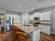 Spacious kitchen island with granite countertops, stainless steel appliances, and modern cabinetry at 12492 Eastpointe Dr, Dade City, FL 33525
