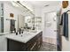 Modern bathroom featuring a double vanity, marble counters, updated fixtures and tile floor at 1432 50Th Ne Ave, St Petersburg, FL 33703