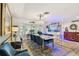 Formal dining room boasts elegant decor, large table, and plenty of natural light at 1432 50Th Ne Ave, St Petersburg, FL 33703