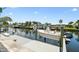 Boat dock with boat. Waterfront living at it's finest at 1432 50Th Ne Ave, St Petersburg, FL 33703